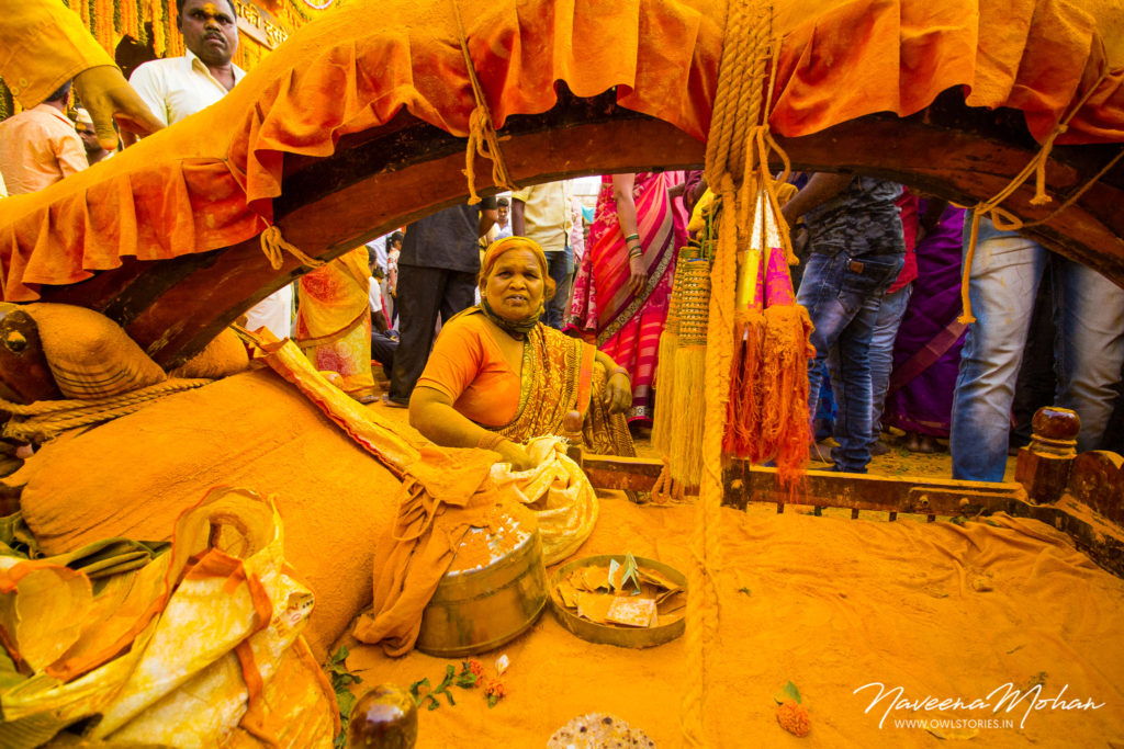 A woman coloured in turmeric