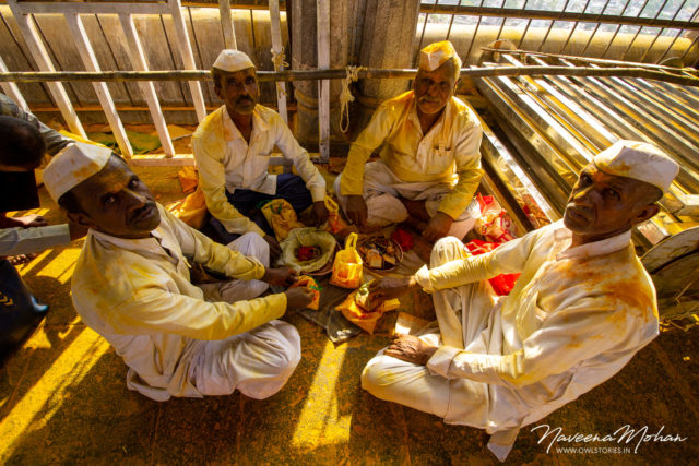 Khandoba temple. People taking a break